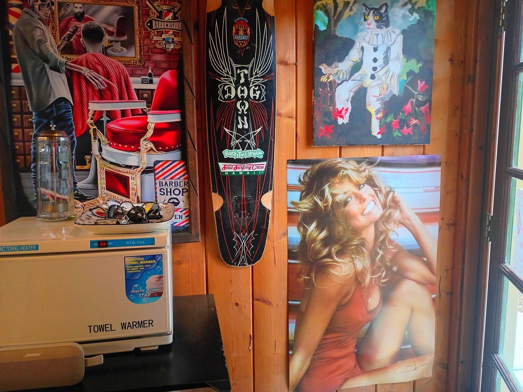 Motorcycle skateboard deck, pinup poster, and wall art