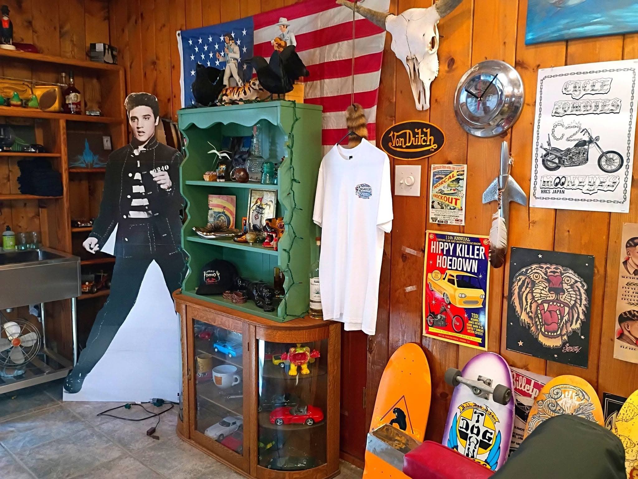 Cardboard cutout, American flag, and vintage signs
